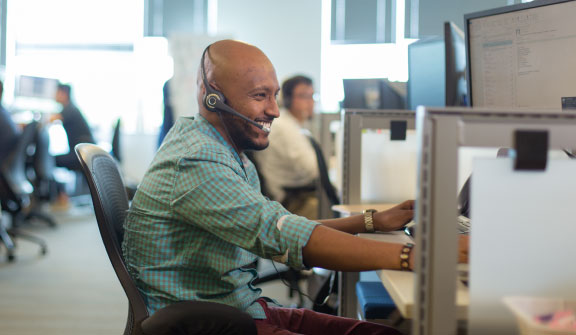 Freightquote employee on phone with customer