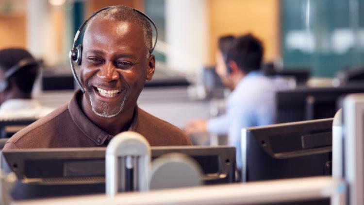 Worker on the phone with customer
