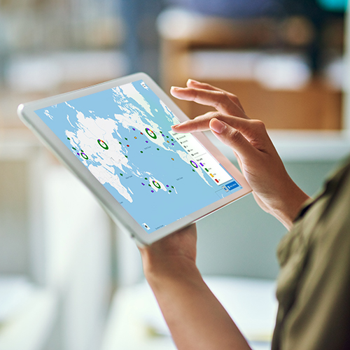 Person holding a tablet with TMS tracking software
